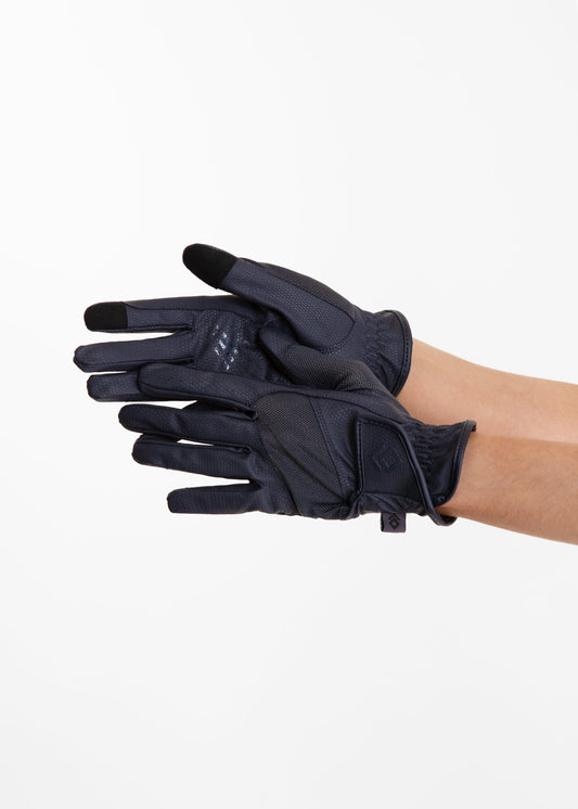 Black gloves held by a hand on a white background