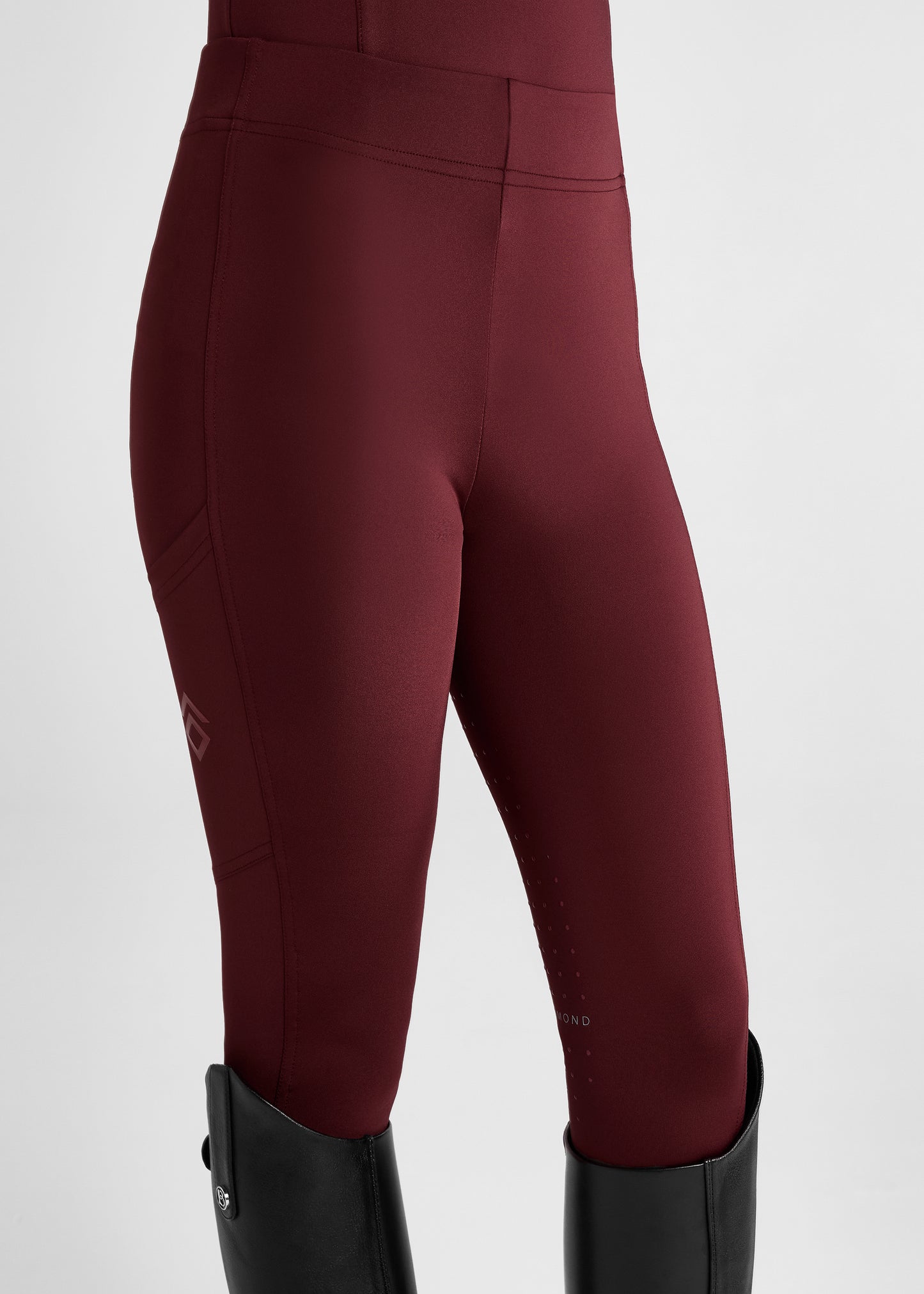 Aztec Diamond Riding Leggings:
“Aztec Diamond riding leggings featuring high-stretch fabric, supportive waistband, and sleek side pocket design”
“Detail of Aztec Diamond riding leggings showing reinforced knee patches and subtle logo branding”
“Pair of Aztec Diamond riding leggings displayed flat, highlighting contoured seams and technical performance material”
