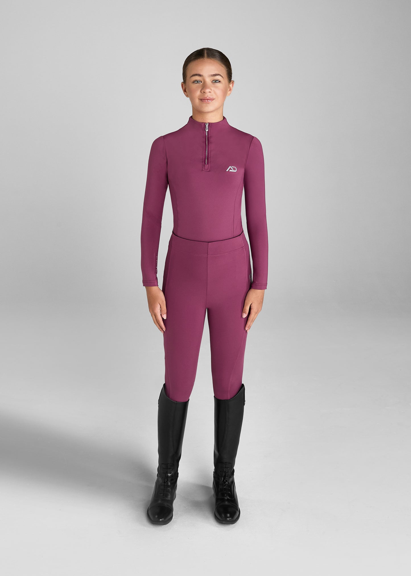 Aztec Diamond Riding Leggings:
“Aztec Diamond riding leggings featuring high-stretch fabric, supportive waistband, and sleek side pocket design”
“Detail of Aztec Diamond riding leggings showing reinforced knee patches and subtle logo branding”
“Pair of Aztec Diamond riding leggings displayed flat, highlighting contoured seams and technical performance material”
