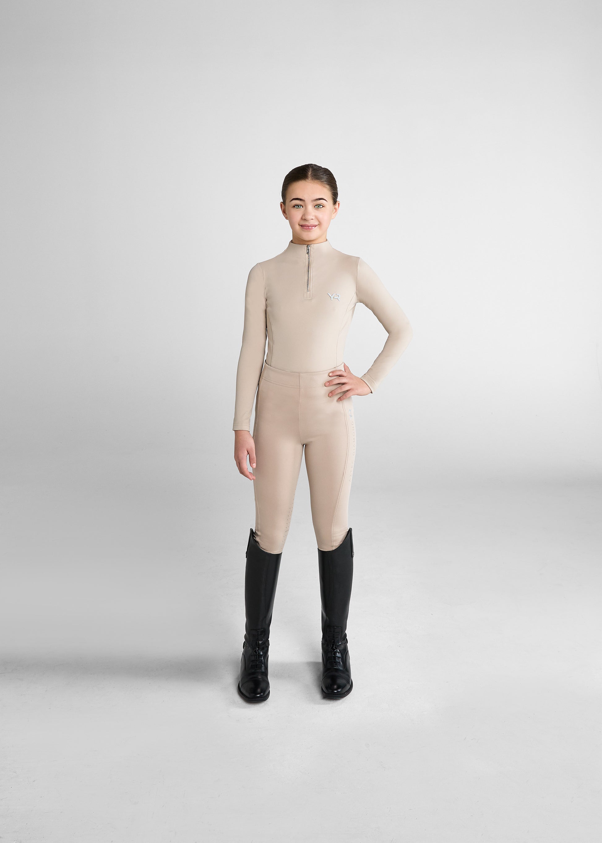 Aztec Diamond Riding Leggings:
“Aztec Diamond riding leggings featuring high-stretch fabric, supportive waistband, and sleek side pocket design”
“Detail of Aztec Diamond riding leggings showing reinforced knee patches and subtle logo branding”
“Pair of Aztec Diamond riding leggings displayed flat, highlighting contoured seams and technical performance material”
