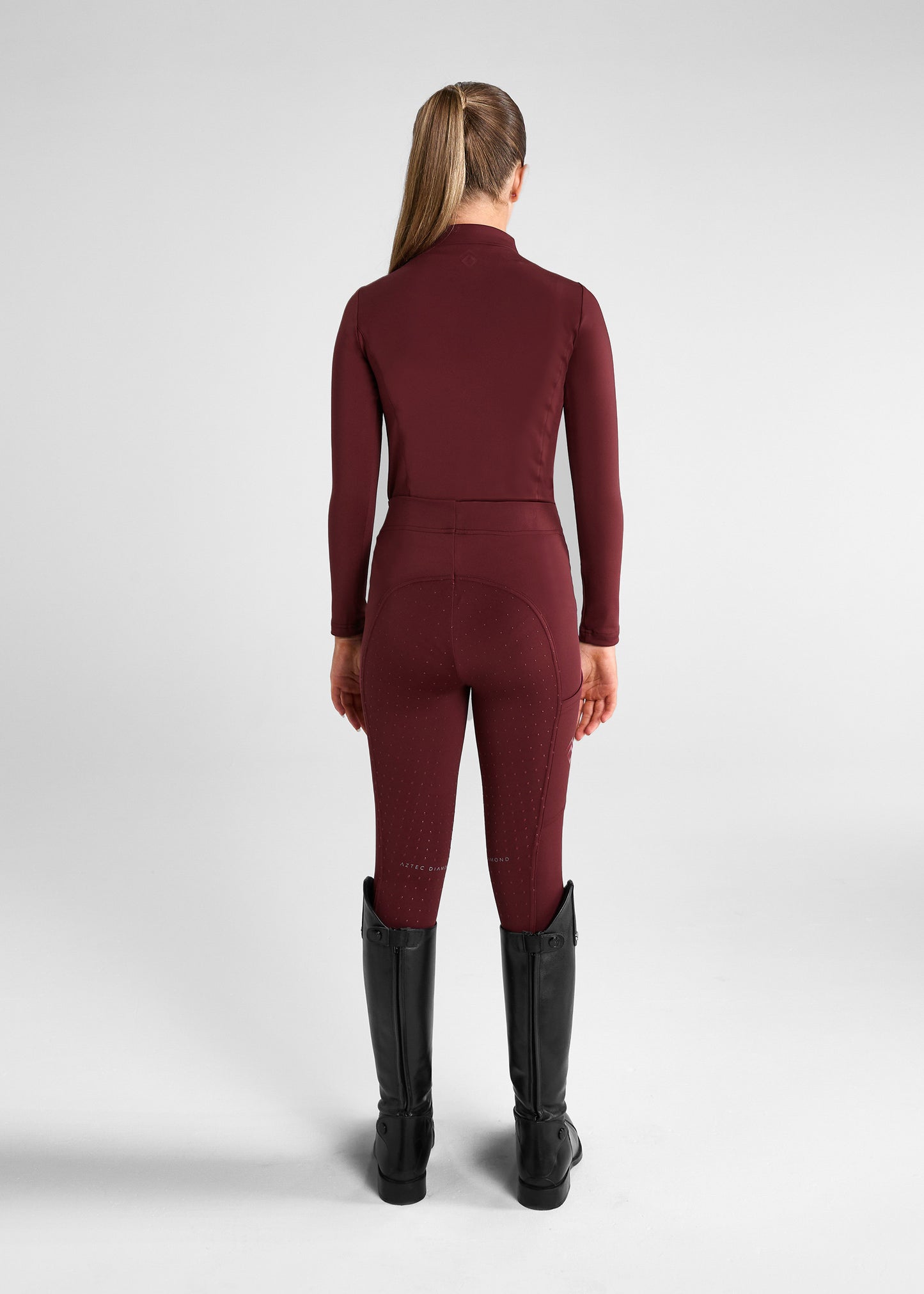 Aztec Diamond Riding Leggings:
“Aztec Diamond riding leggings featuring high-stretch fabric, supportive waistband, and sleek side pocket design”
“Detail of Aztec Diamond riding leggings showing reinforced knee patches and subtle logo branding”
“Pair of Aztec Diamond riding leggings displayed flat, highlighting contoured seams and technical performance material”
